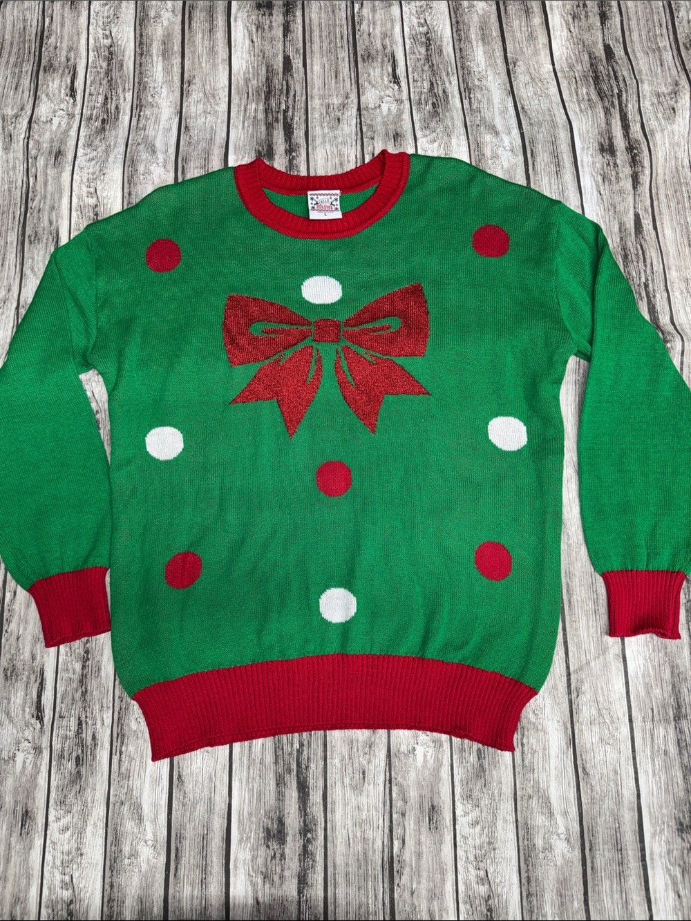 Well Worn Women’s Green Holiday Sweater with Red Bow